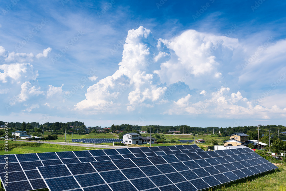 田舎の夏空の入道雲と太陽光発電ソーターパネル Stock 写真 Adobe Stock 田舎の夏空の入道雲と太陽光発電ソーターパネル Stock 写真 Adobe Stock