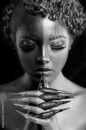 Beauty Fashion model girl black and white portrait, woman portrait with perfect makeup and manicure. Beauty trends