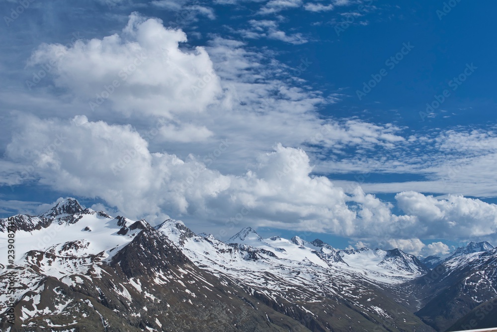 landscape of alpine peaks covered with snow