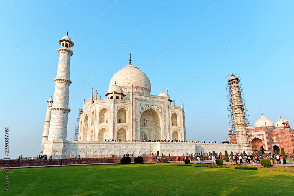 Front view of Taj Mahal in India.Construction of the mausoleum was commissioned in 1632 by the emperor Shah Jahan. In order to preserve the pristine beauty authorities perform renovations regularly.