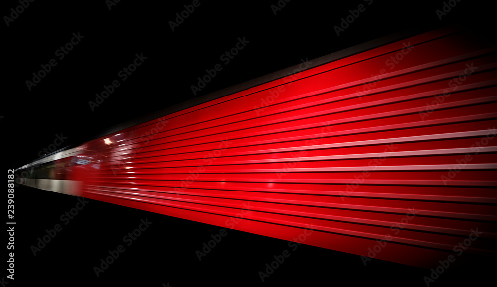 Obraz premium Abstract image of a train departing a European station at night