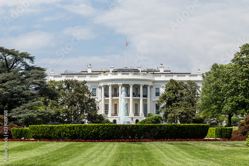 The White House in Washington DC from the South Lawn on a beautiful day. photo