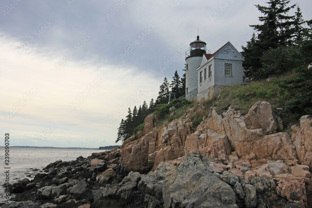Bass Harbor Head Lighthouse on the rocky coast of Bass Harbor, Maine.