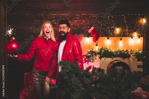 Sexy couple in a Night Club. Winter holidays and people concept. Greatest Love Stories. Christmas man suit fashion. Christmas bomb. Creative boom.