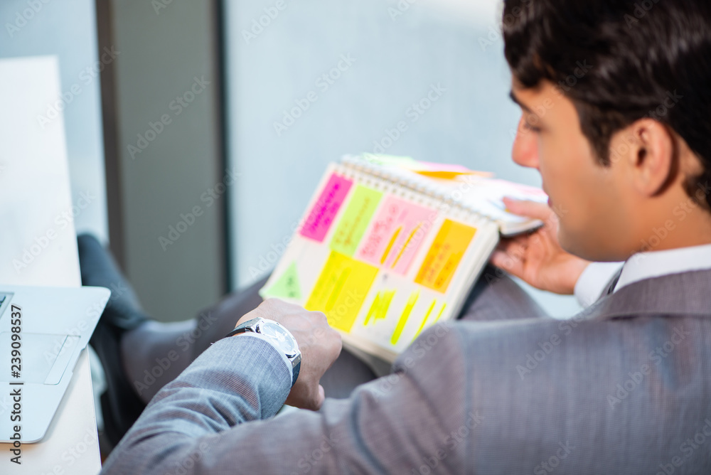 Young successful businessman working at the office Young successful businessman working at the office