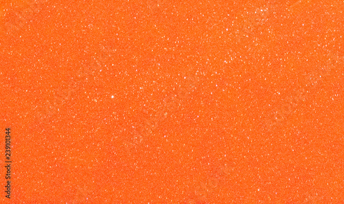 Christmas New Year Orange Gold Glitter background. Holiday abstract texture fabric. Element, flash. 
