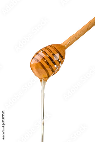 Stick with honey isolated on white background