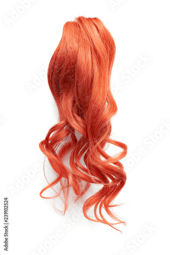 Natural curly red hair isolated on white background