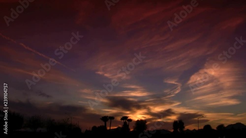 Orange Arizona Sunset with fast moving clouds