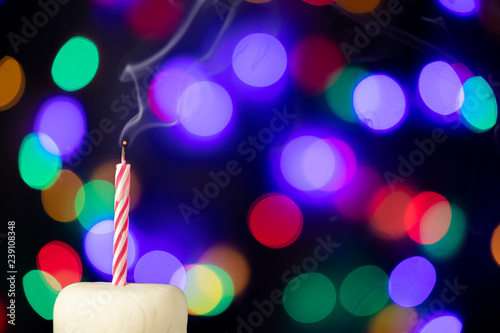 Birthday candle with bokeh lights