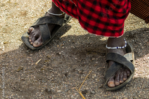 African tire indoctrinated sandals
