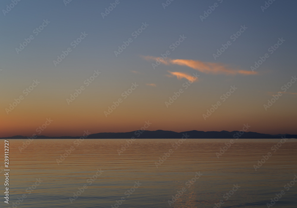 Beautiful sunset with clouds and sea. Beautiful sunset with clouds and sea.