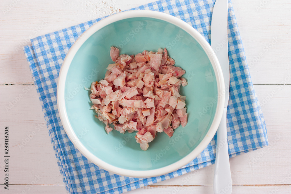 Step-by-step cooking salad with smoked chicken, corn, crackers, step 1 - adding ingredients - smoked chicken, top view, horizontal Step-by-step cooking salad with smoked chicken, corn, crackers, step 1 - adding ingredients - smoked chicken, top view, horizontal