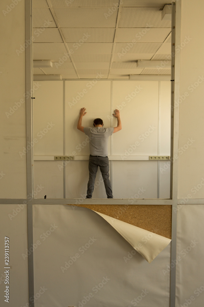 Fototapeta premium Man against the wall