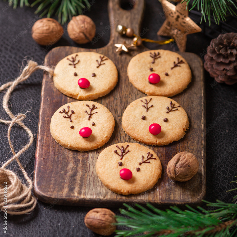Homemade deer cookies decorated chocolate and red candies Soft focus Greeting card Homemade deer cookies decorated chocolate and red candies Soft focus Greeting card