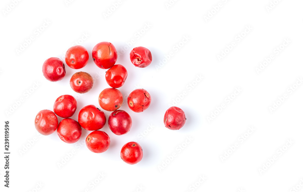 pink peppercorn isolated on white background. top view