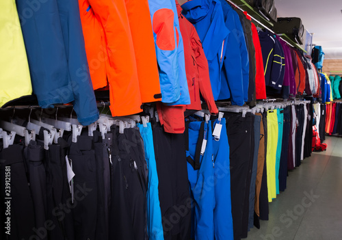 range of ski clothes in sports store