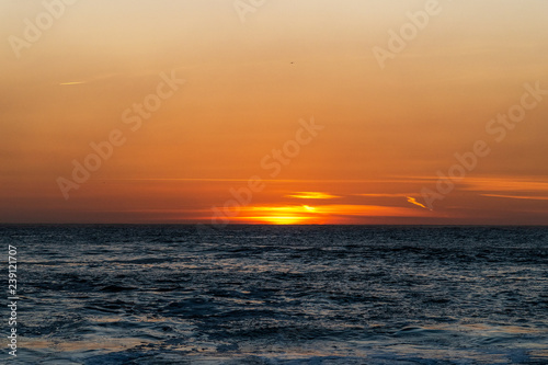 Sunset on Atlantic ocean  Nazare  Portugal.