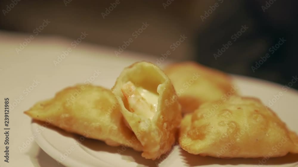 fried empanadas made at home to share with friends before dinner fried empanadas made at home to share with friends before dinner