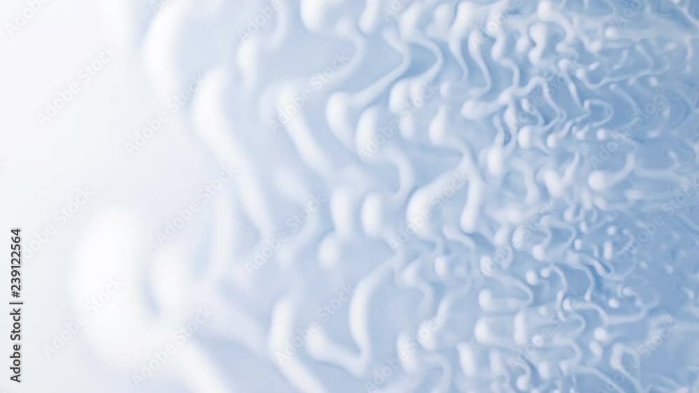 Wind forms beautiful waves of white paint on a blue background. Abstract colorful background. Wind forms beautiful waves of white paint on a blue background. Abstract colorful background.