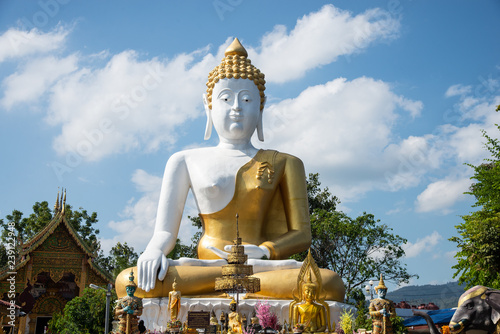 Buddha statue  (Thai: Luang Por Tan Jai ) in Wat Phra Tat Doi Kum, The Buddhist temple in Chiang Mai, northern Thailand © Olalaja