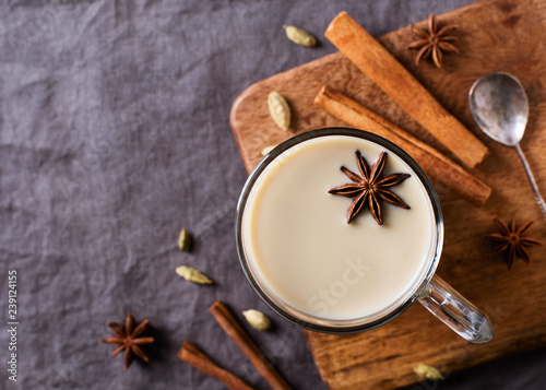Fototapeta Naklejka Na Ścianę i Meble -  Mug of spice latter tea or coffee, winter and autumn hot drink