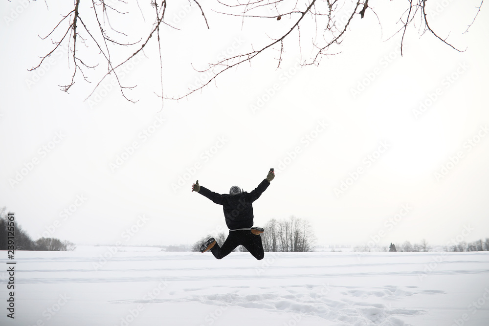 A man on a walk. Winter landscape. Tourist in winter journey. A man on a walk. Winter landscape. Tourist in winter journey.