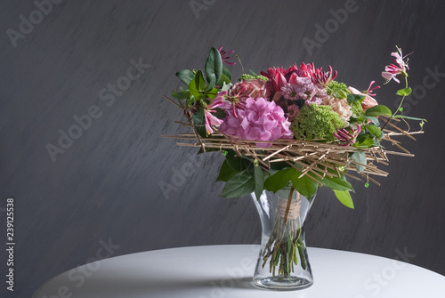 Fototapeta Naklejka Na Ścianę i Meble -  beautiful modern wedding bouquet on white table. Selective focus