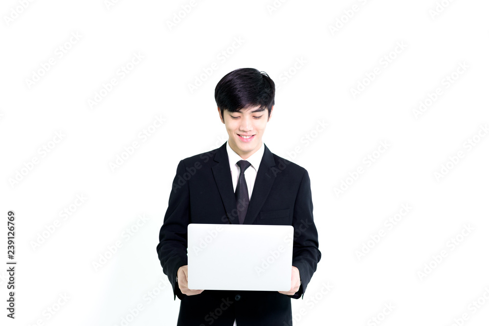 Asian business handsome man has holding laptop for woking with happy and relaxing isolated on white background. Asian business handsome man has holding laptop for woking with happy and relaxing isolated on white background.