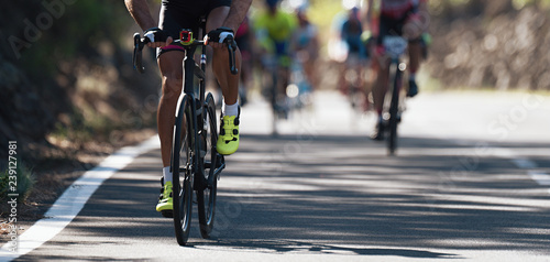 Fototapeta Naklejka Na Ścianę i Meble -  Cycling competition,cyclist athletes riding a race
