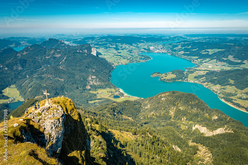Scenic view from Schafberg over the alpine foothills of Northern Limestone Alps and Mondsee Lake.