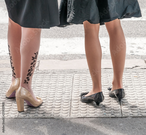 Beautiful women legs on the street