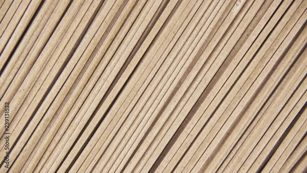 Pasta buckwheat soba noodles rotates clockwise on the background top view Pasta buckwheat soba noodles rotates clockwise on the background top view