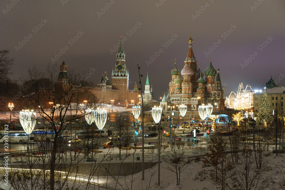 Image of Moscow in the winter time.  Spasskaya Tower, St. Basil's Cathedral,  GUM (Central Department store)
