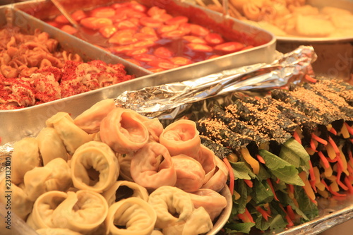 Korean Street Food inside Gwangjang Market in Seoul, South Korea photo
