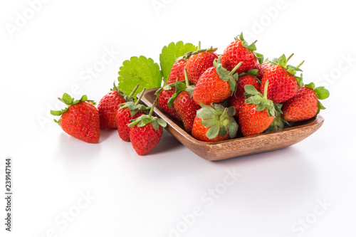 A bowl of beautiful strawberries isolated on white background with clipping path  close up  macro.