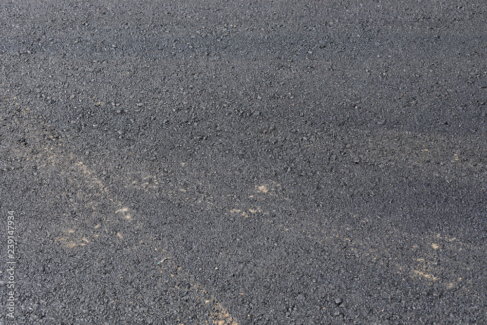 black asphalt construction road with tarmac surface material industry