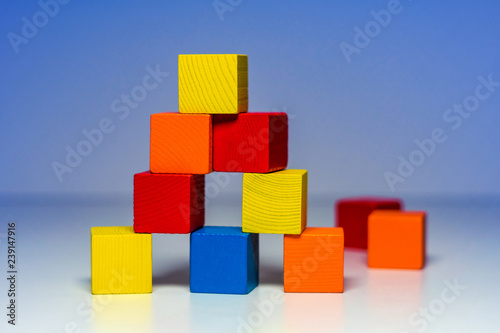 Building from wooden colourful childrens blocks