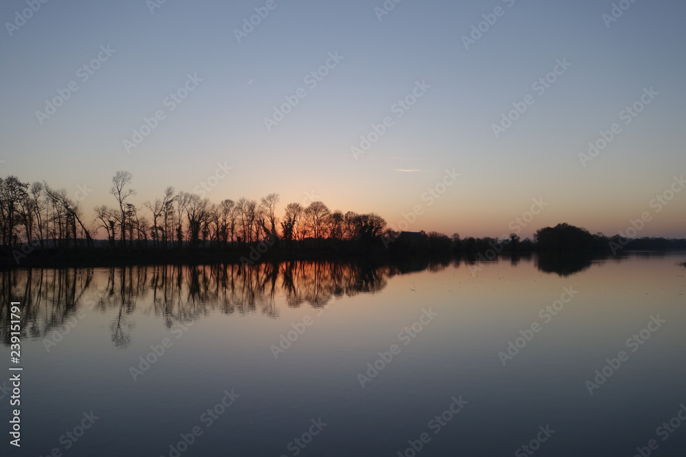 Fototapeta premium Sunset over the lake