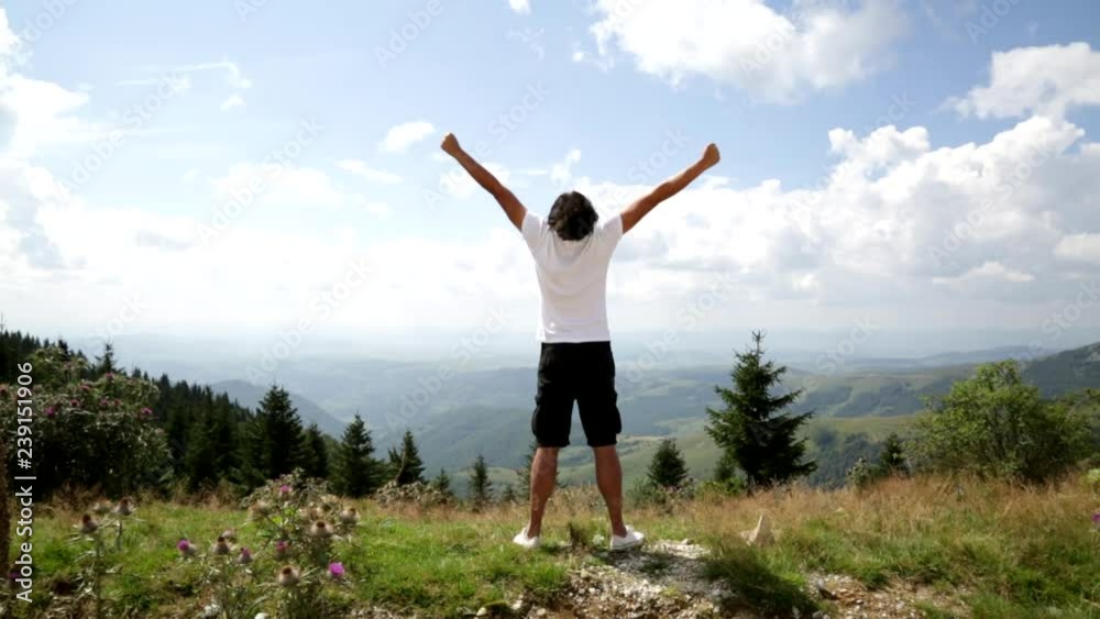 Hiker Having Fun Achieving the Top Hiker Having Fun Achieving the Top
