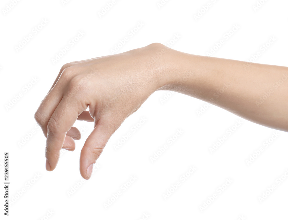 Woman holding something in hand on white background, closeup Woman holding something in hand on white background, closeup