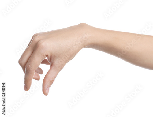 Woman holding something in hand on white background, closeup