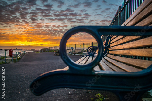 Seaside bench at sunset - Southsea  photo