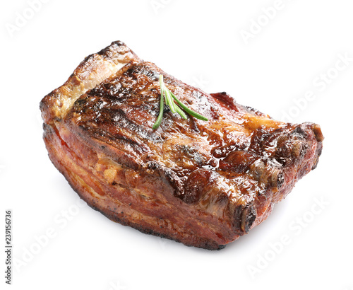 Delicious barbecued ribs with rosemary on white background
