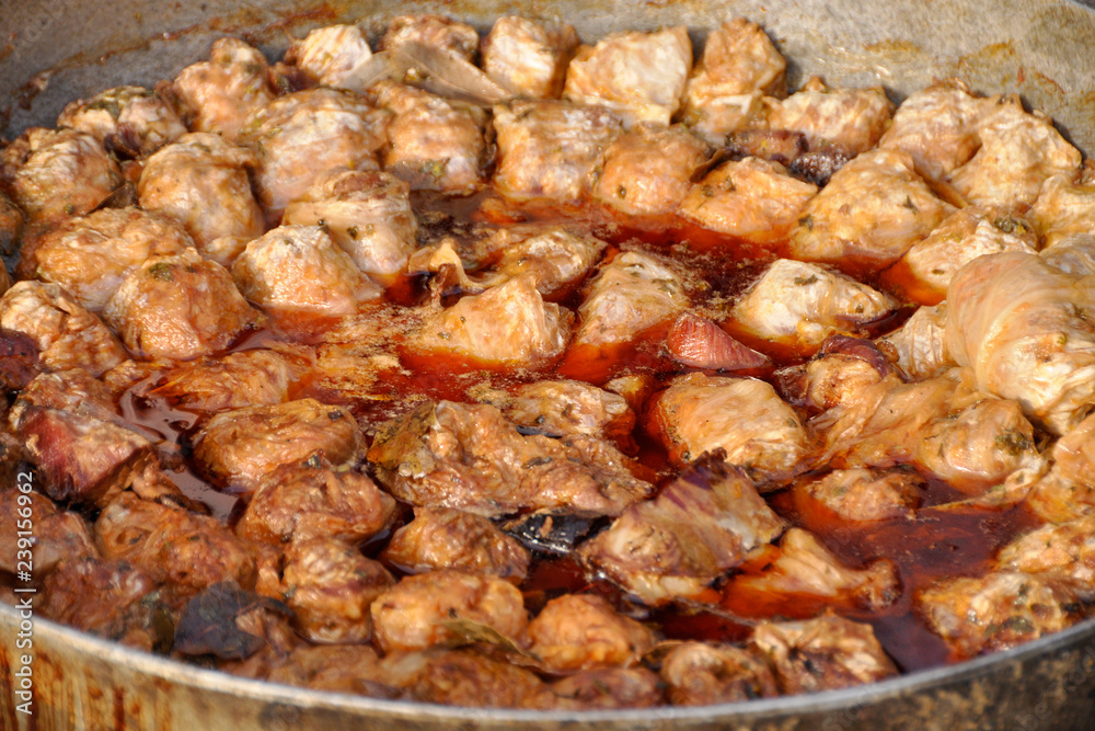 Hot, ready to serve traditional cabbage rolls in clay pot.