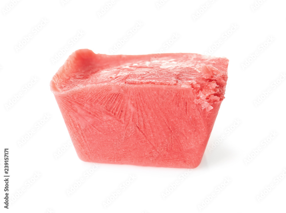 Tasty berry ice cube on white background