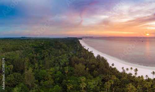 Fototapeta Naklejka Na Ścianę i Meble -  Aerial view tropical beach island reef caribbean sea dramatic sky at sunset sunrise. Indonesia Moluccas archipelago, Kei Islands, Banda Sea. Top travel destination, diving snorkeling
