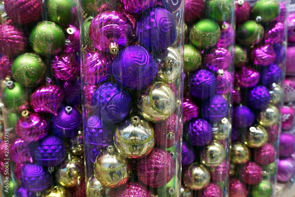 Christmas decorations in an interior decoration shop: spiral tube with baubles - Image