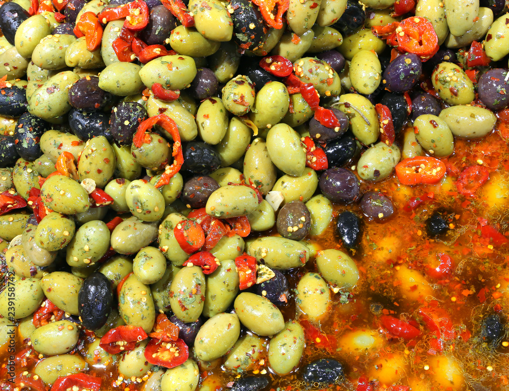 background of many black and green olives background of many black and green olives