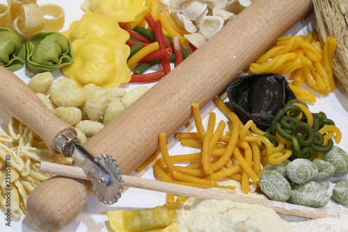 kitchen rolling pin and fresh Italian pasta made with natural in